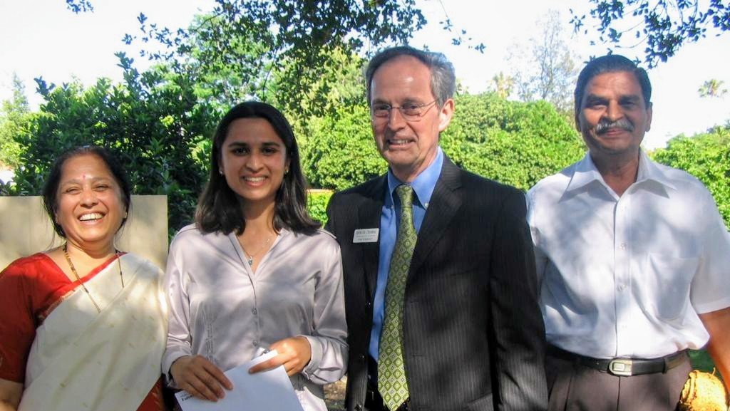 Sukhada Fadnavis with her parents and then Caltech President Jean-Lou Chameau at graduation.