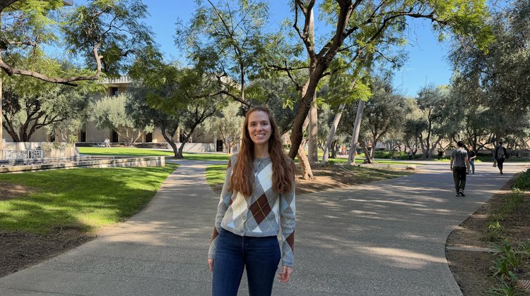 Camila Farrés standing on Caltech campus.