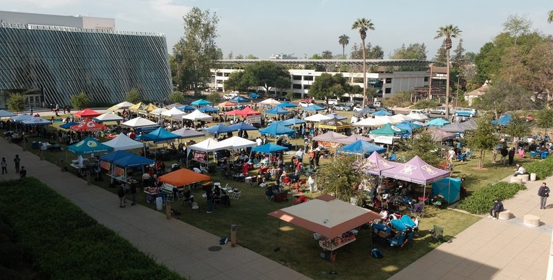 Aerial view of Science Olympiad with colorful tents in front of Resnick Sustainability Center